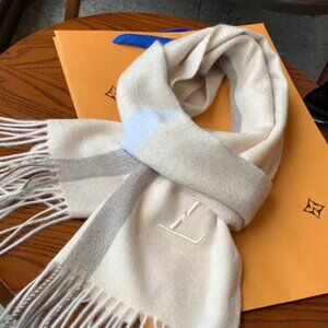 Louis Vuitton Reykjavik Scarf. This scarf is a well-known, luxurious accessory f